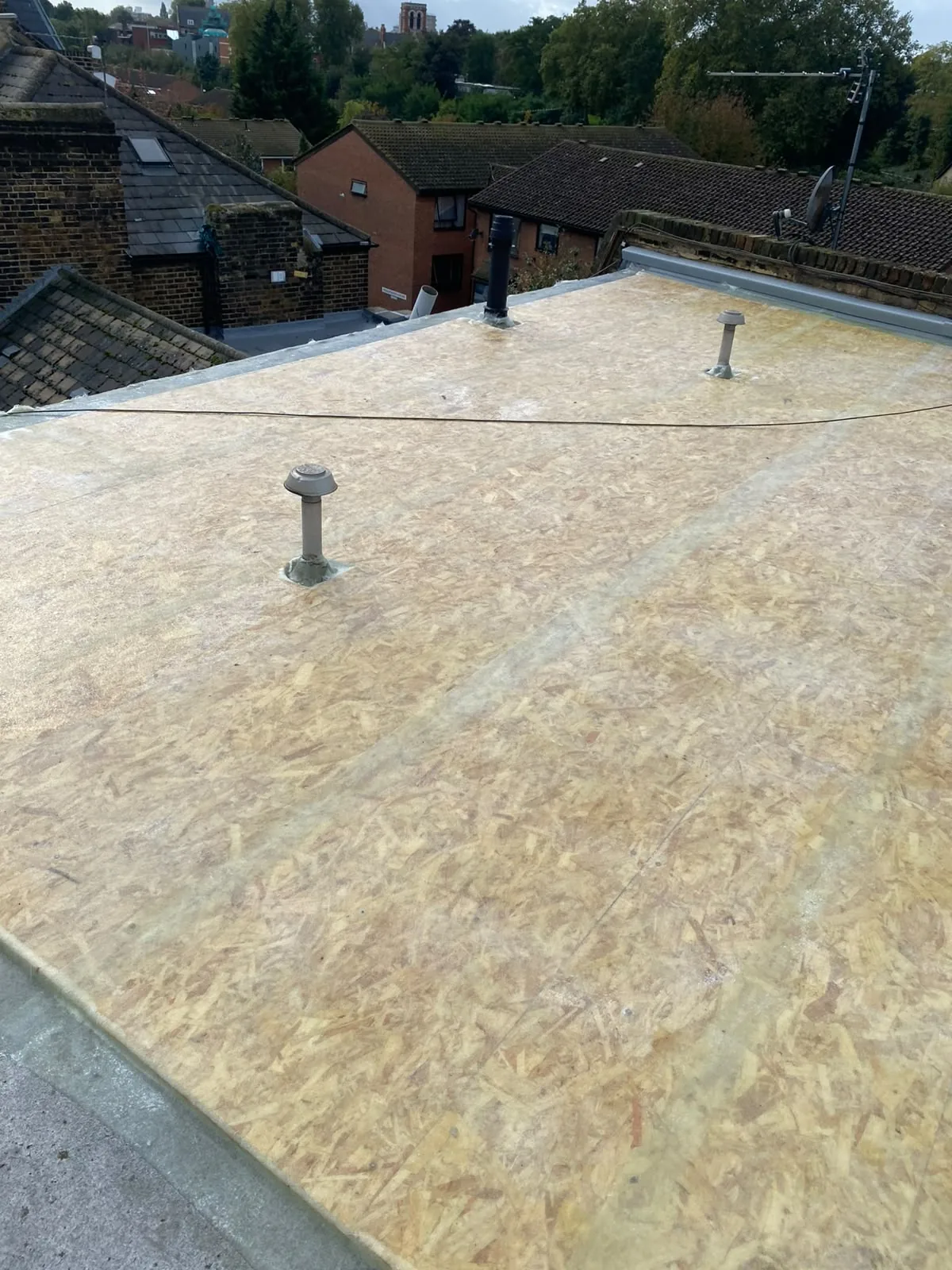 Completed waterproof flat roofing surface