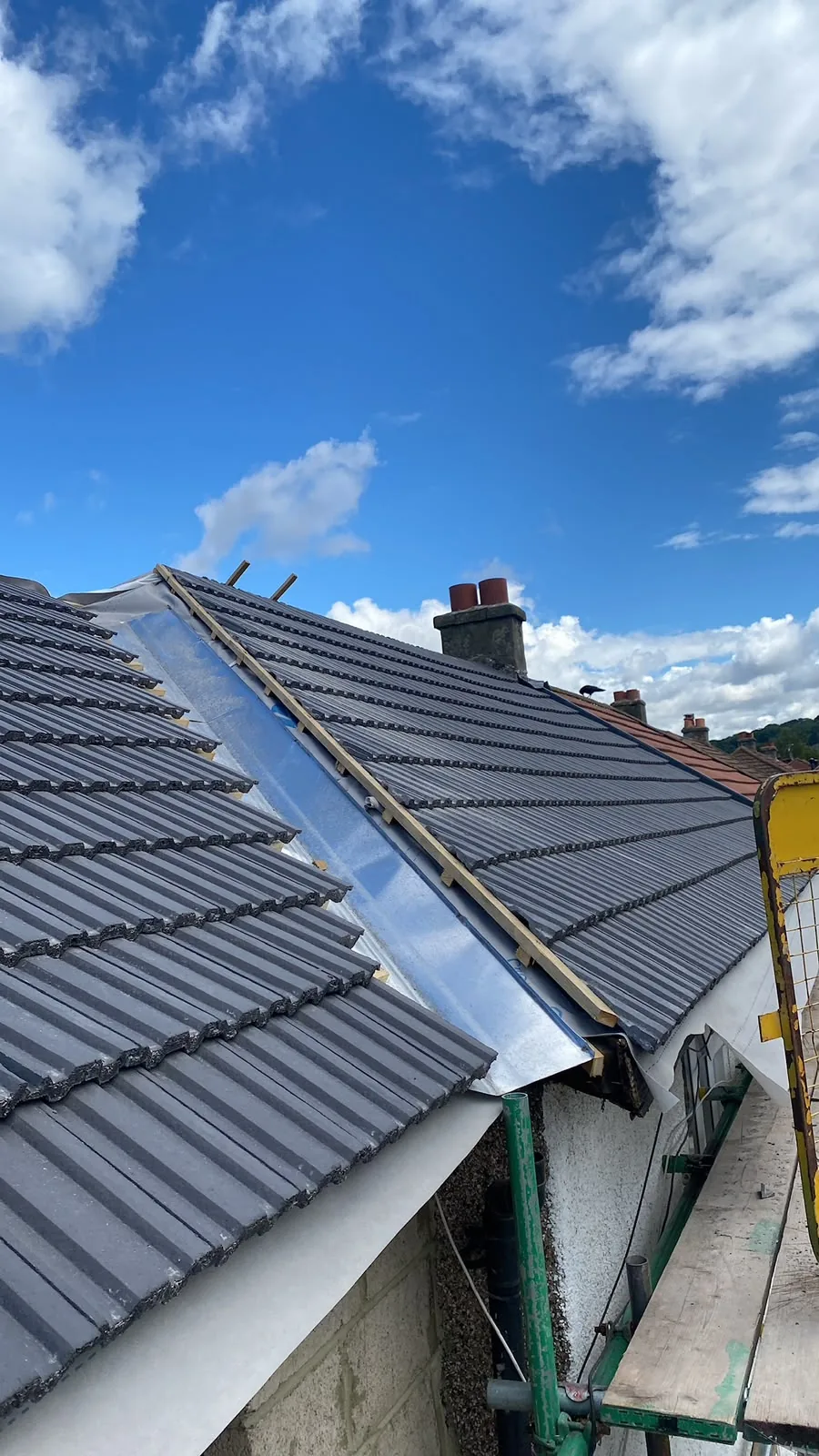 Pitched tiled roof with roof windows
