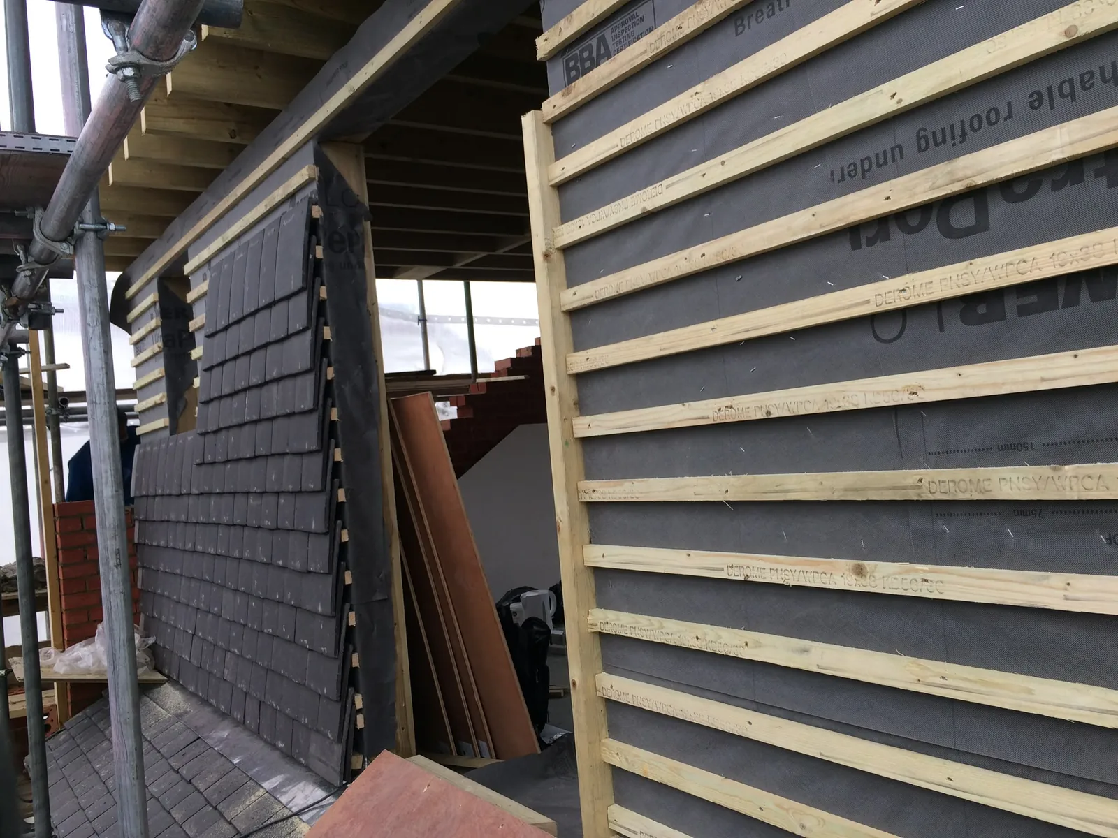 New brick wall construction in progress