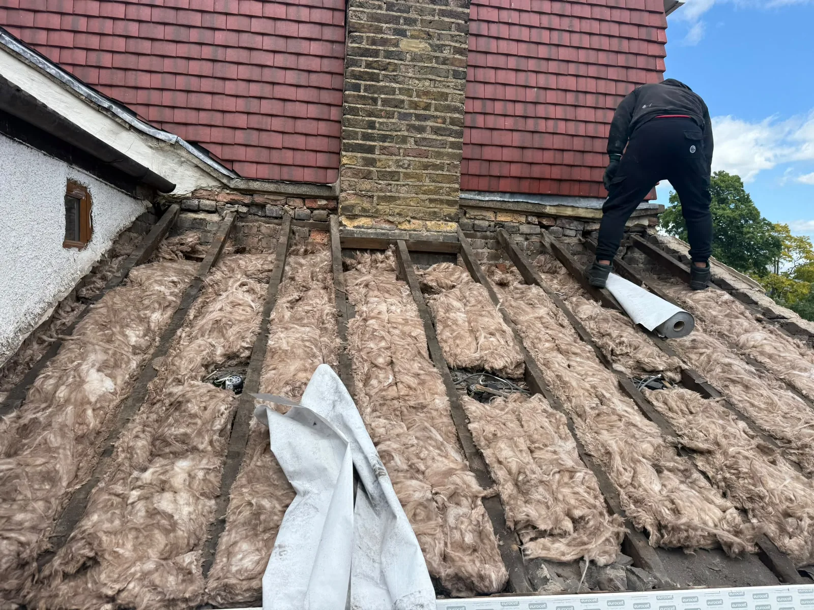 Roof repair work being carried out on a London property
